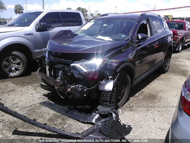 2T3ZFREV5HW329590 - 2017 TOYOTA RAV4 LE GRAY photo 2