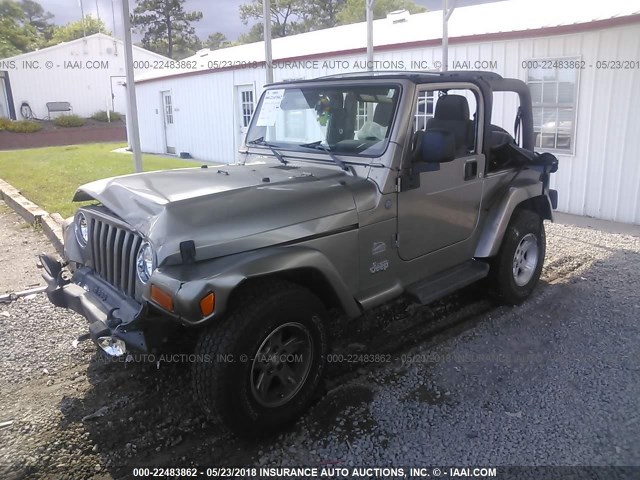 1J4FA59SX4P739666 - 2004 JEEP WRANGLER / TJ SAHARA GRAY photo 2