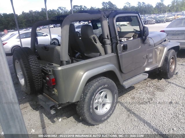 1J4FA59SX4P739666 - 2004 JEEP WRANGLER / TJ SAHARA GRAY photo 4