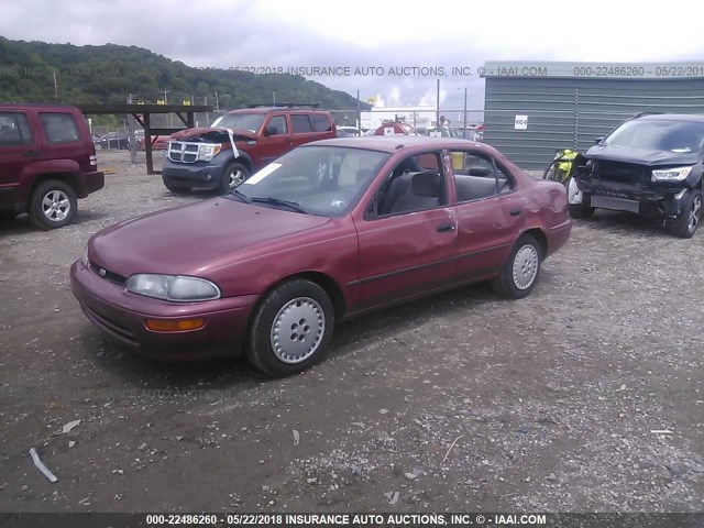 1Y1SK5262VZ461734 - 1997 GEO PRIZM LSI RED photo 2