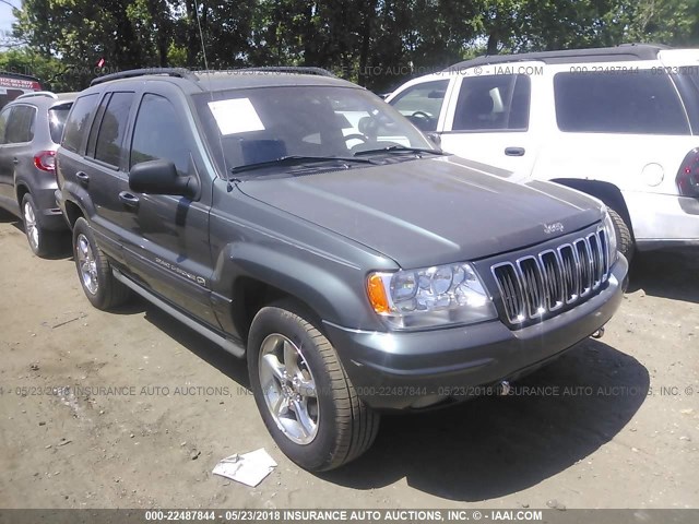 1J8GW68J32C184406 - 2002 JEEP GRAND CHEROKEE OVERLAND GRAY photo 1