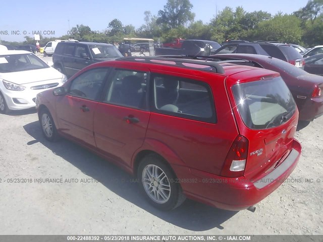 1FAFP36N95W315545 - 2005 FORD FOCUS ZXW RED photo 3