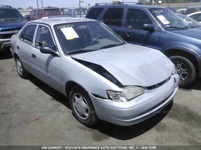 1NXBR12E4XZ148986 - 1999 TOYOTA COROLLA VE/CE/LE SILVER photo 1