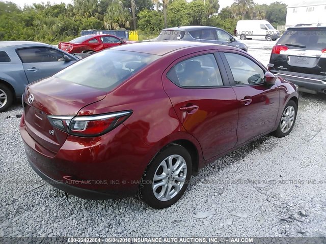 3MYDLBZV4GY109534 - 2016 TOYOTA SCION IA RED photo 4