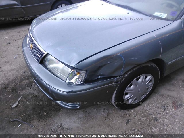 4T1BF18B7XU312091 - 1999 TOYOTA AVALON XL/XLS GREEN photo 6