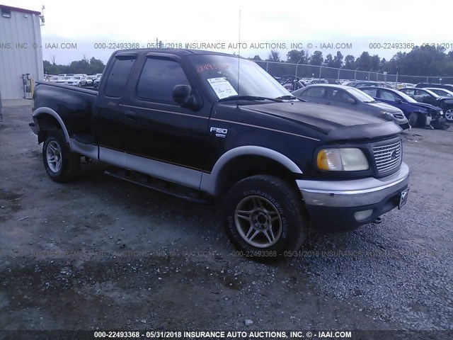 1FTRX08L2XKA04843 - 1999 FORD F150 BLACK photo 1