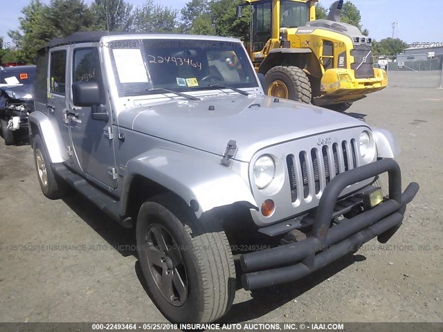 1C4BJWEG4CL122362 - 2012 JEEP WRANGLER UNLIMITE SAHARA SILVER photo 1