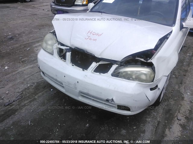 KL5JD52Z24K022454 - 2004 SUZUKI FORENZA S WHITE photo 6