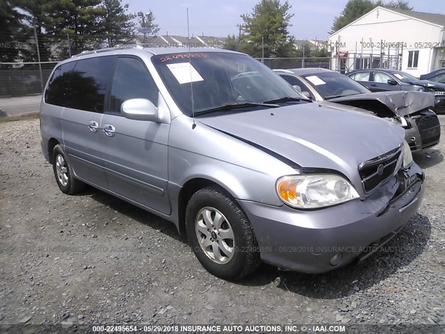 KNDUP132456759027 - 2005 KIA SEDONA EX/LX GRAY photo 1