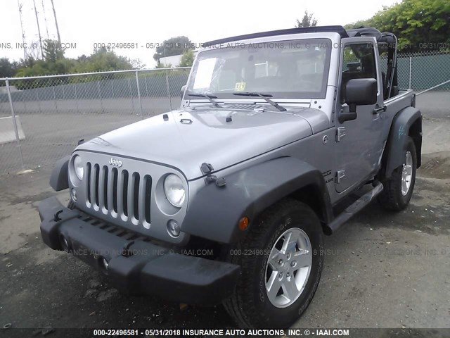 1C4AJWAG8FL751399 - 2015 JEEP WRANGLER SPORT SILVER photo 2