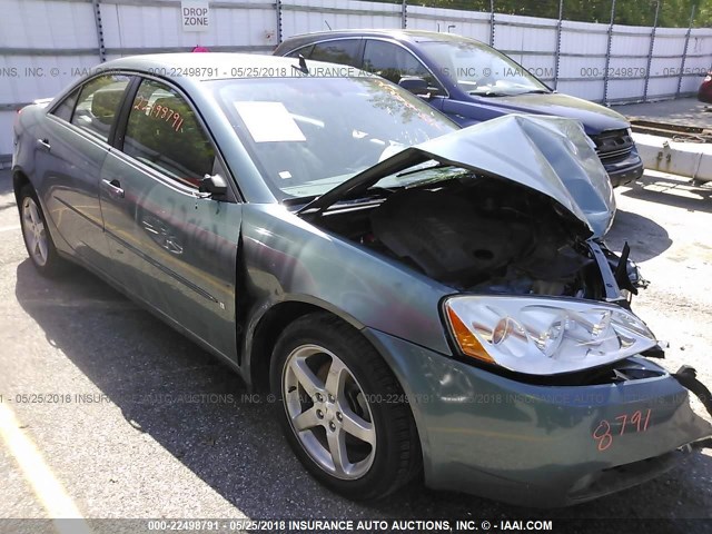 1G2ZG57N794140123 - 2009 PONTIAC G6 GREEN photo 1