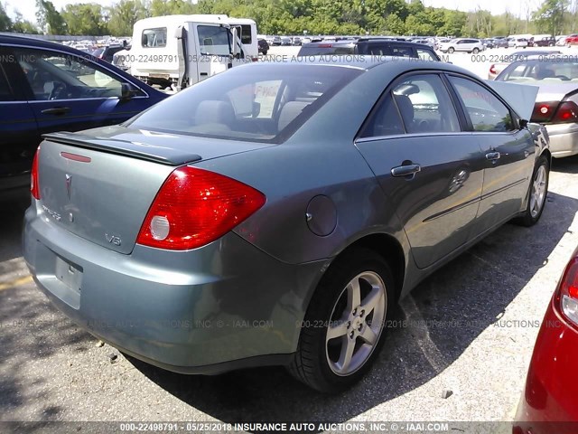 1G2ZG57N794140123 - 2009 PONTIAC G6 GREEN photo 4