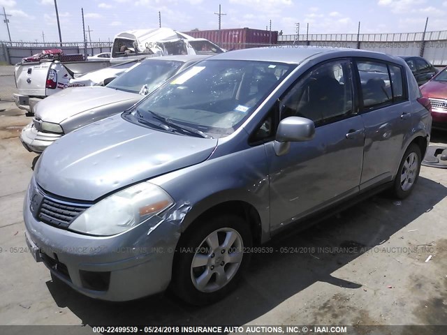 3N1BC13E49L410591 - 2009 NISSAN VERSA S/SL SILVER photo 2