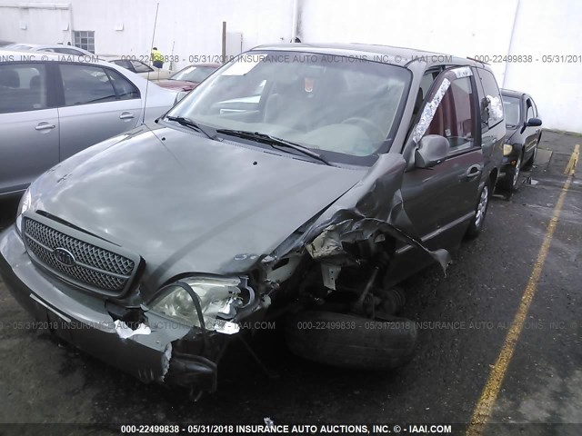 KNDUP132156641467 - 2005 KIA SEDONA EX/LX GREEN photo 6