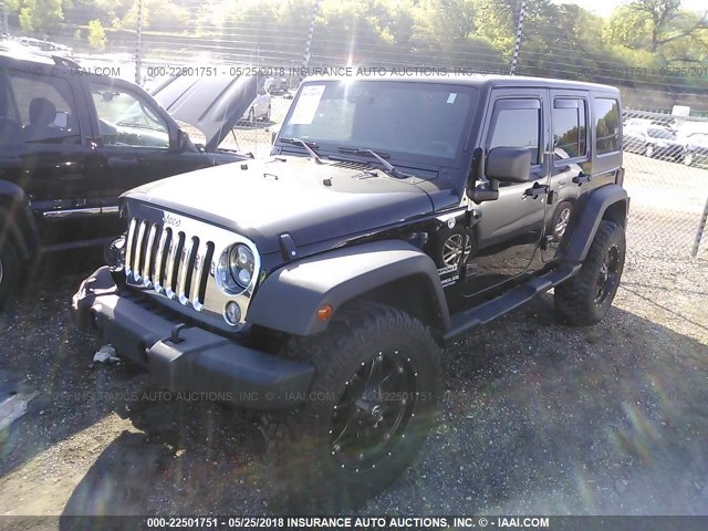 1C4BJWDG3EL148634 - 2014 JEEP WRANGLER UNLIMITE SPORT BLACK photo 2