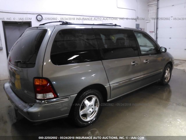 2FMZA5249XBB07909 - 1999 FORD WINDSTAR SE GREEN photo 4