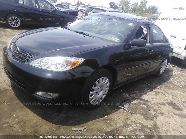 4T1BE30KX3U180982 - 2003 TOYOTA CAMRY LE/XLE/SE შავი ფოტო 2
