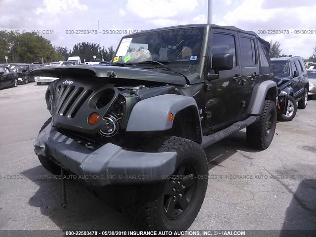 1J4GB39118L589389 - 2008 JEEP WRANGLER UNLIMITE X GREEN photo 2