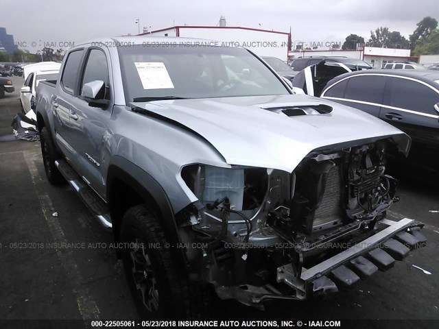 3TMCZ5AN1HM090035 - 2017 TOYOTA TACOMA DBL CAB/SR/TRDSPT/OR/PRO SILVER photo 1