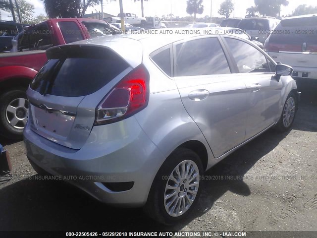 3FADP4FJ0GM197091 - 2016 FORD FIESTA TITANIUM SILVER photo 4