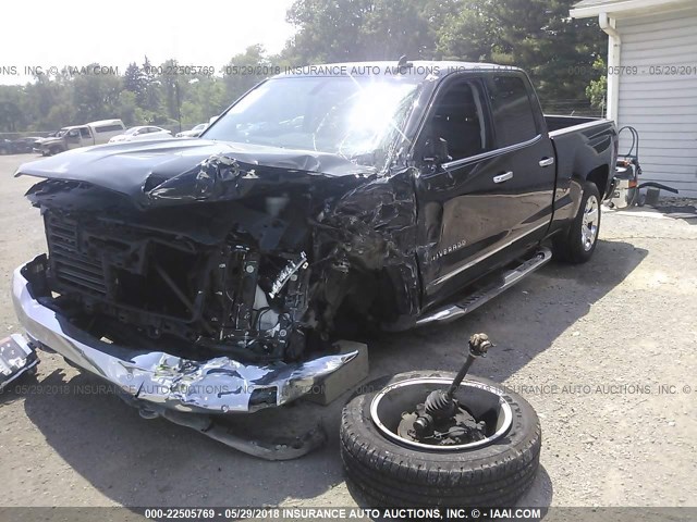 1GCVKSEC8HZ142828 - 2017 CHEVROLET SILVERADO K1500 LTZ BLACK photo 2