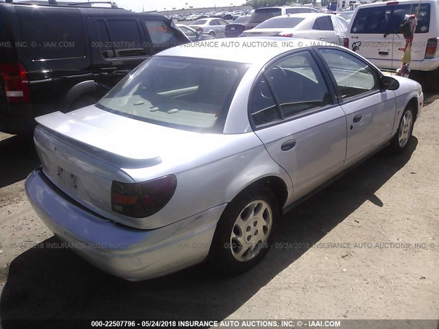 1G8ZF52862Z259087 - 2002 SATURN SL SILVER photo 4