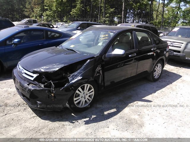 1FAHP3HN7AW146030 - 2010 FORD FOCUS SEL შავი ფოტო 2
