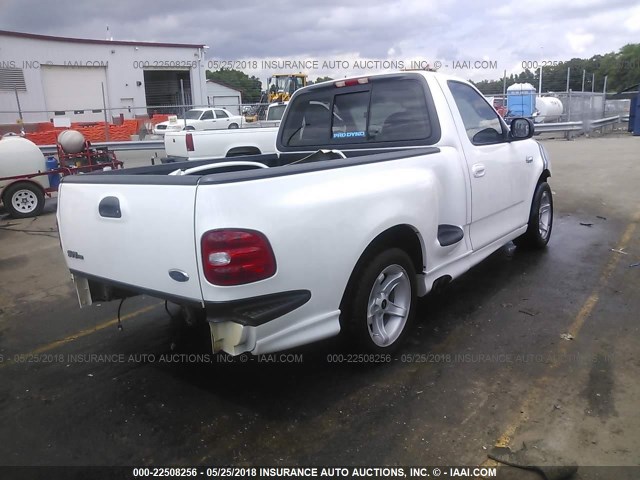 2FTZF0738XCA83184 - 1999 FORD F150 SVT LIGHTNING WHITE photo 4