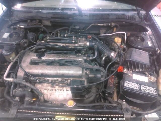 JNKCP11A1XT008234 - 1999 INFINITI G20 GREEN photo 10