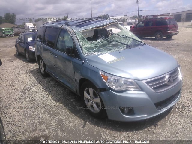 2V8HW64XX9R500508 - 2009 VOLKSWAGEN ROUTAN SEL PREMIUM BLUE photo 1