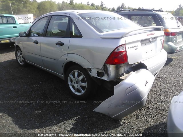 1FAFP34NX5W227851 - 2005 FORD FOCUS ZX4 GRAY photo 6