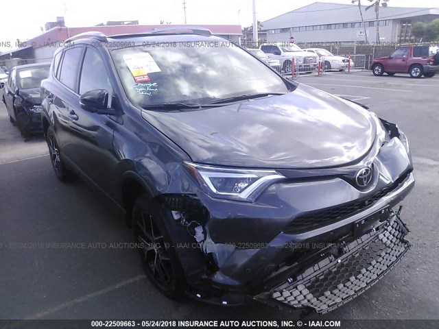 JTMNFREV3JJ160110 - 2018 TOYOTA RAV4 SE GRAY photo 1