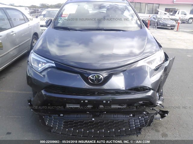 JTMNFREV3JJ160110 - 2018 TOYOTA RAV4 SE GRAY photo 6