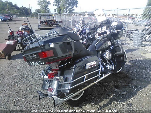 1HD1FC4197Y658871 - 2007 HARLEY-DAVIDSON FLHTCUI BLACK photo 4