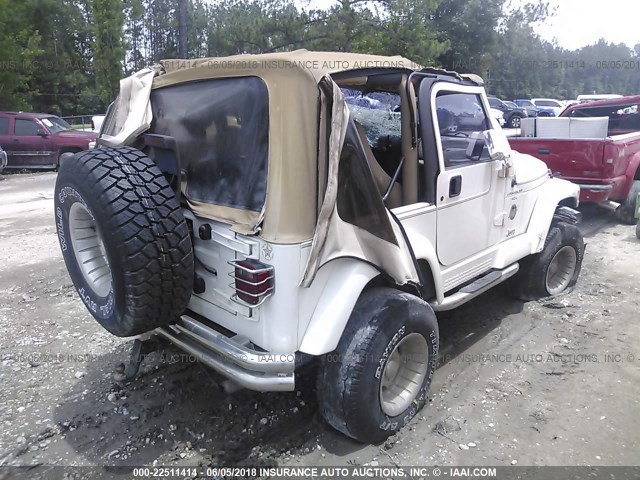 1J4FY49SXXP420584 - 1999 JEEP WRANGLER / TJ SAHARA WHITE photo 4