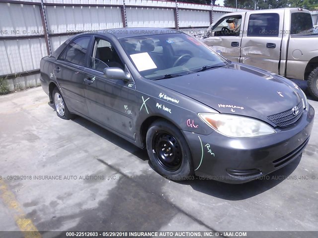 4T1BE32K03U774557 - 2003 TOYOTA CAMRY LE/XLE/SE ნაცრისფერი ფოტო 1