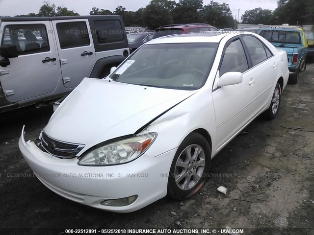 JTDBE32K440257291 - 2004 TOYOTA CAMRY LE/XLE WHITE photo 2