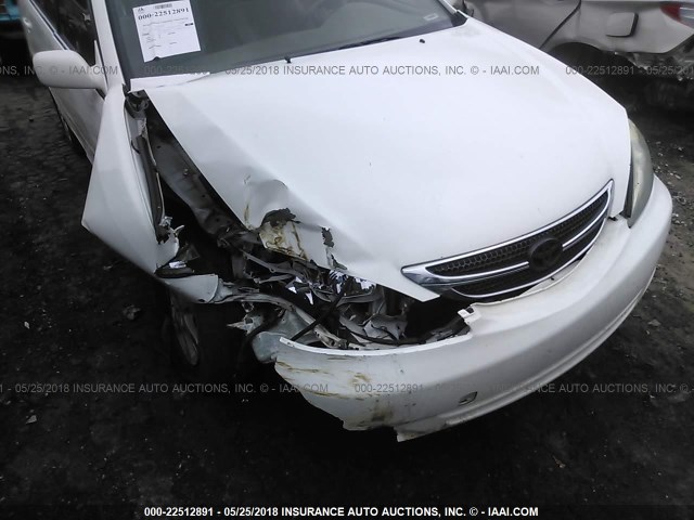 JTDBE32K440257291 - 2004 TOYOTA CAMRY LE/XLE WHITE photo 6