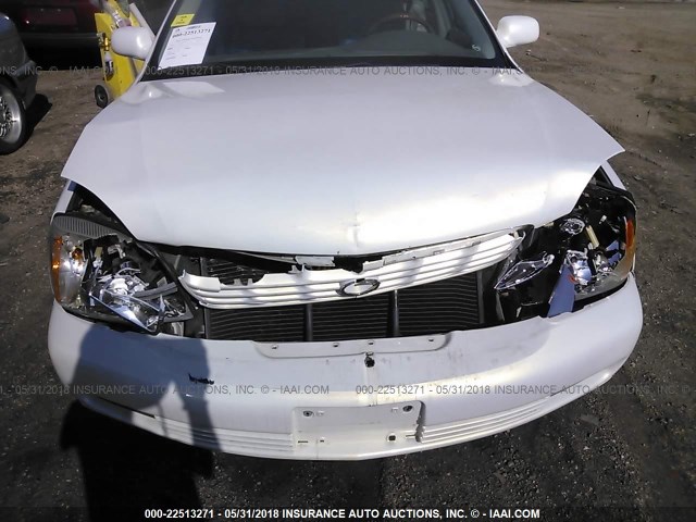 1G6KF57915U138027 - 2005 CADILLAC DEVILLE DTS WHITE photo 6