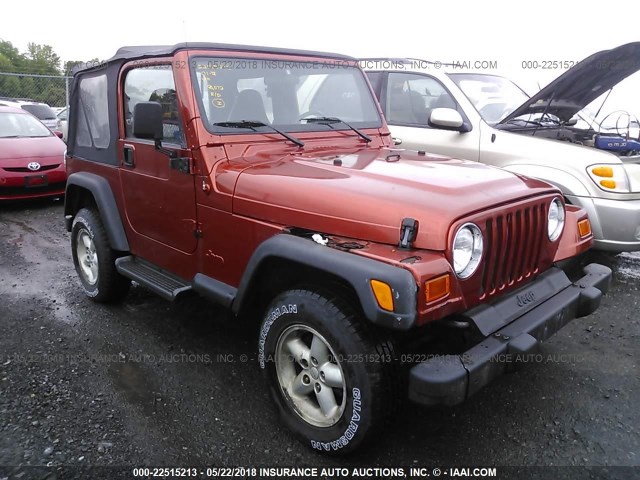 1J4FA29P21P327490 - 2001 JEEP WRANGLER / TJ SE ORANGE photo 1