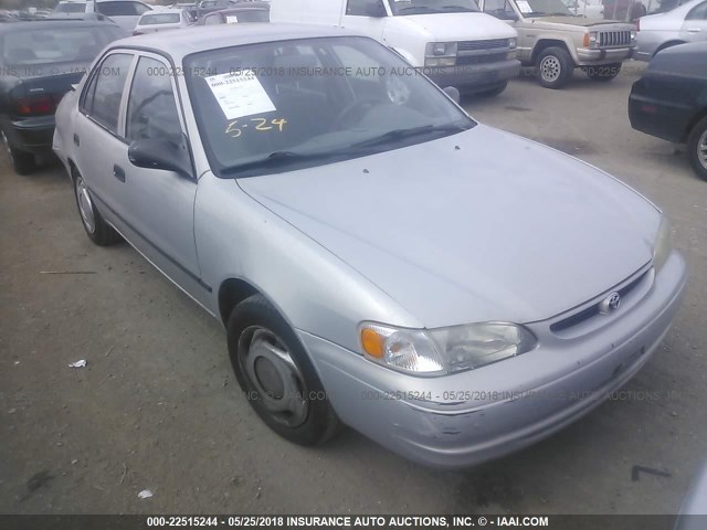 1NXBR12E4YZ352379 - 2000 TOYOTA COROLLA VE/CE/LE SILVER photo 1