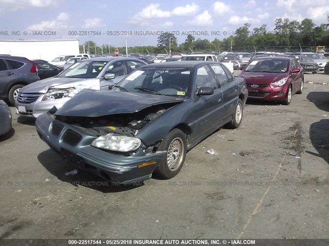 1G2NE52T7VC753756 - 1997 PONTIAC GRAND AM SE GREEN photo 2