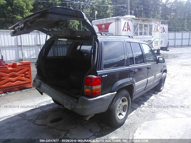 1J4GZ58S0WC275229 - 1998 JEEP GRAND CHEROKEE LAREDO/TSI BLACK photo 4