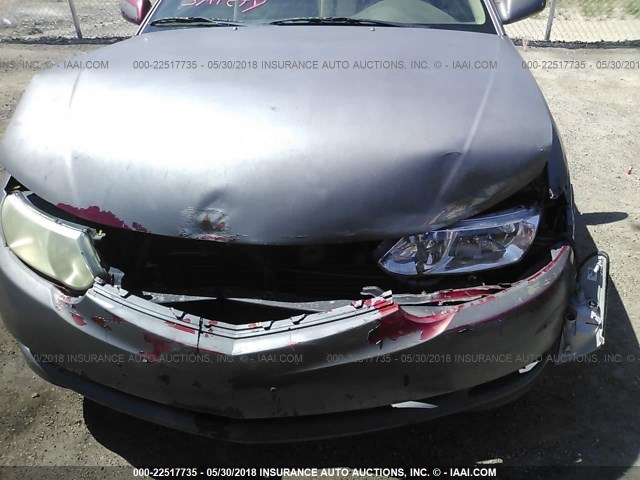 2T1CE22PX2C011018 - 2002 TOYOTA CAMRY SOLARA SE GRAY photo 6