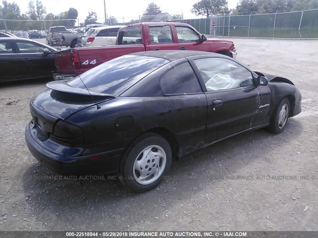 1G2JB1240X7528549 - 1999 PONTIAC SUNFIRE SE BLACK photo 4