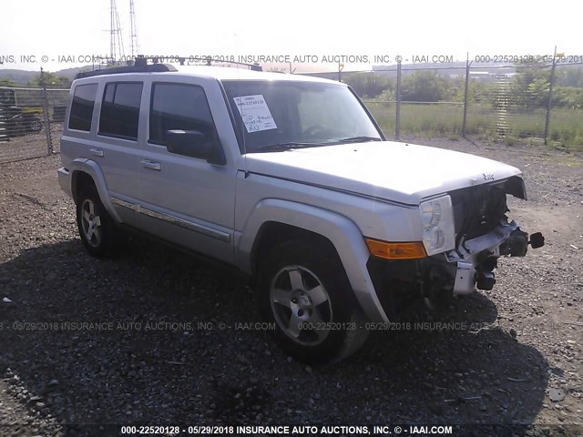 1J4RG4GK1AC140831 - 2010 JEEP COMMANDER SPORT SILVER photo 1