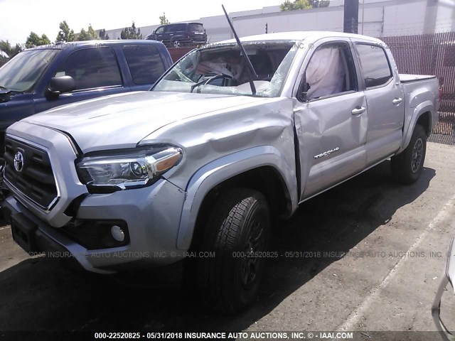 3TMAZ5CN6HM050912 - 2017 TOYOTA TACOMA DBL CAB/SR5/TRD SPORT/OR SILVER photo 2