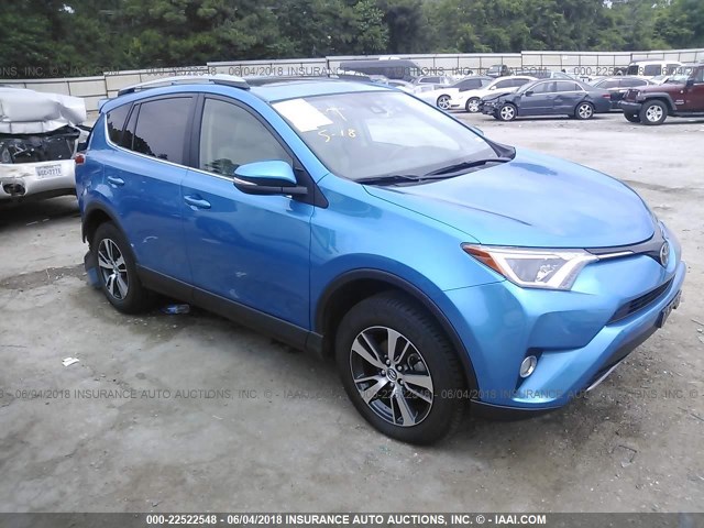 JTMWFREV7HD100117 - 2017 TOYOTA RAV4 XLE BLUE photo 1