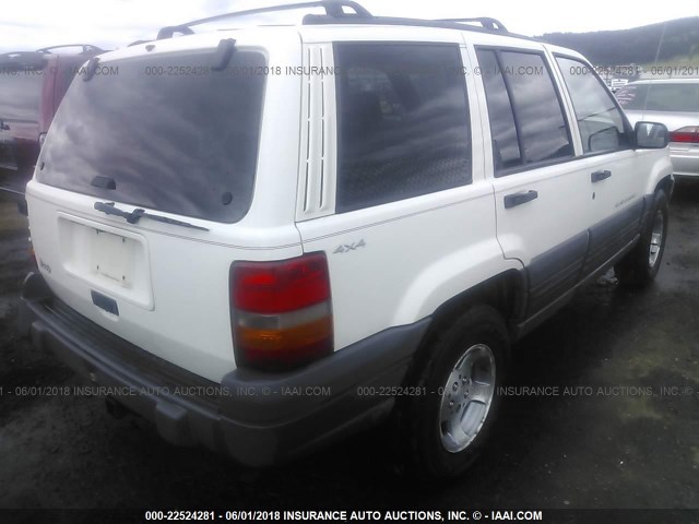 1J4GZ58S3VC738592 - 1997 JEEP GRAND CHEROKEE LAREDO/TSI WHITE photo 4