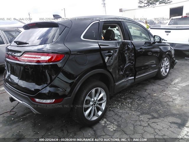 5LMCJ2C99HUL00097 - 2017 LINCOLN MKC SELECT შავი ფოტო 4